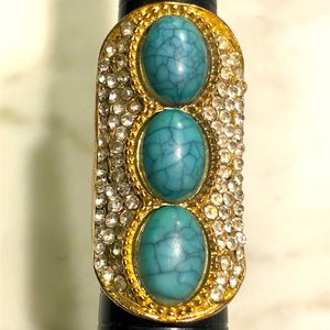 Costume Ring With Rhinestone And Turquoise Color Embellishments